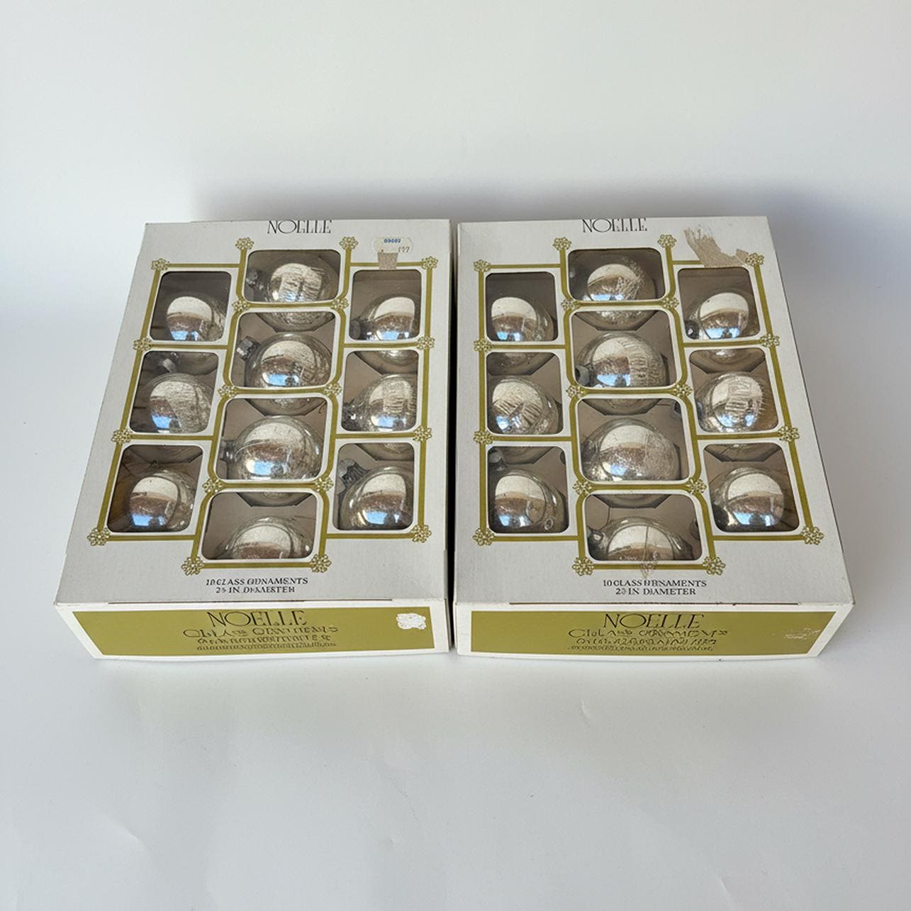1960’s by  Noelle, 20 Glass Silver Stenciled Ornaments 2 boxes of 10, Merry Christmas, Santa on his Sleigh and plain.